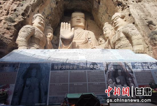 時下，中國“石窟鼻祖”天梯山石窟第13窟大佛足部與局部危巖體搶救性保護項目正在施工。圖為施工現(xiàn)場。陳曉斌 攝